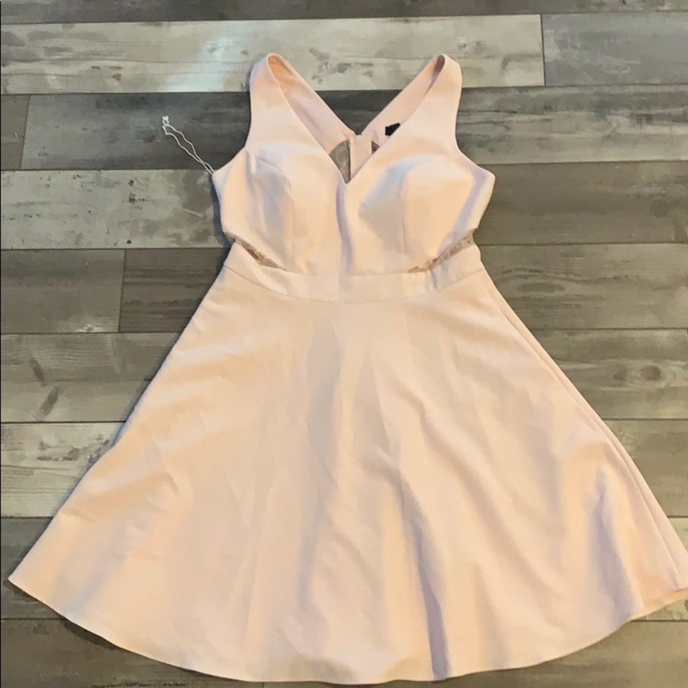 Pink dress with lace cutouts